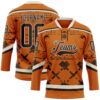 Custom Texas Orange Brown-Cream Tribal Indigenous Grunge Splash Hockey Lace Neck Jersey