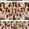 Custom Brown Cream-Texas Orange Tribal Indigenous Grunge Splash Hockey Lace Neck Jersey