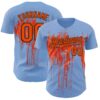 Custom Light Blue Orange-Black Dripping Splatter Paint Authentic Baseball Jersey