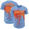 Custom Light Blue Orange-Cream Dripping Splatter Paint Authentic Baseball Jersey